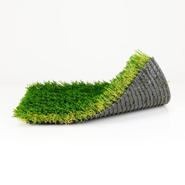 An artificial grass mat on a white background