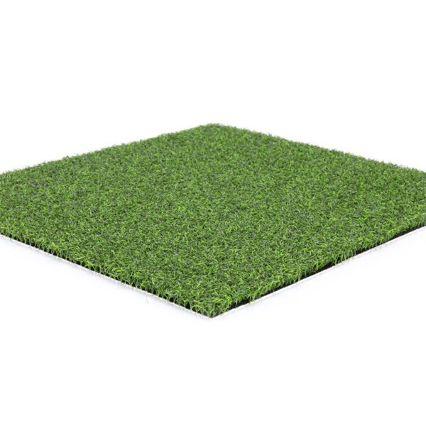 An artificial grass mat on a white background